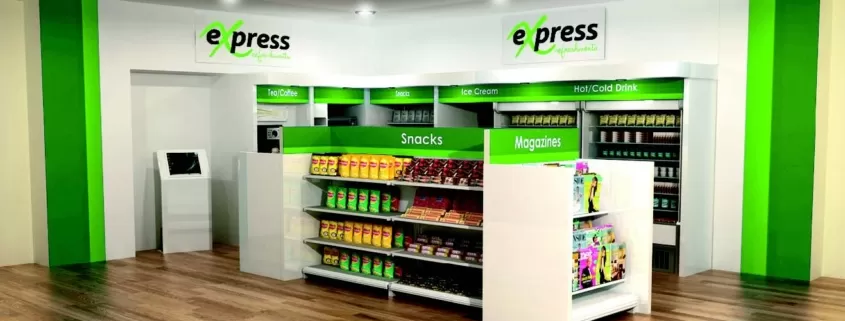 A green and white store with shelves and shelves.