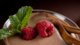 Chocolate mousse with raspberries and mint.