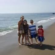 The two boys enjoying their holiday with mum Natasha and big sister Courtney.