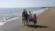 The two boys enjoying their holiday with mum Natasha and big sister Courtney.