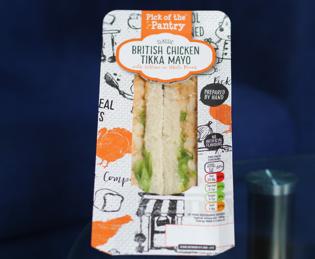 Our Machines observe a sandwich on top of the table.