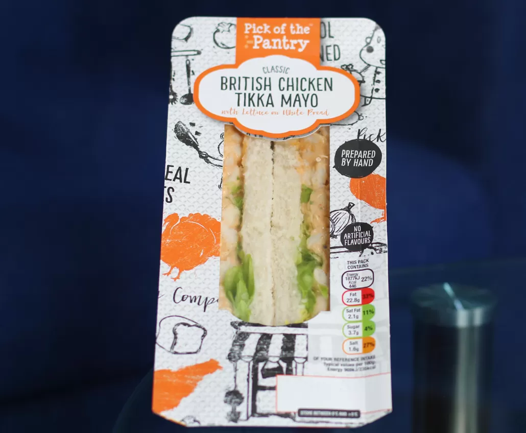 fresh_food_machines Our Machines observe a sandwich on top of the table.