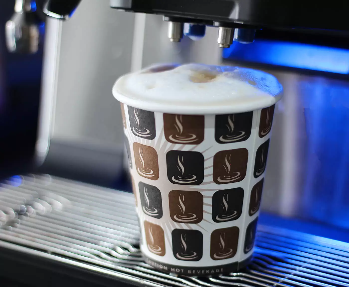 fresh_milk_machine A cup of coffee dispensed by one of our machines.