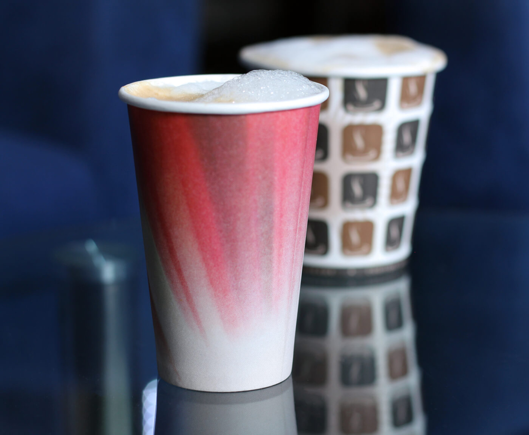 Two coffee cups on a table next to each other, showcasing our machines.
