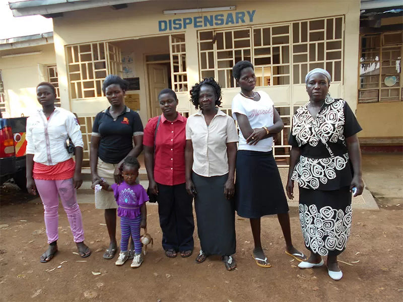 olps_jsc A small group standing in front of a building.