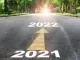 Two arrows pointing in the direction of 2021 and 2022.