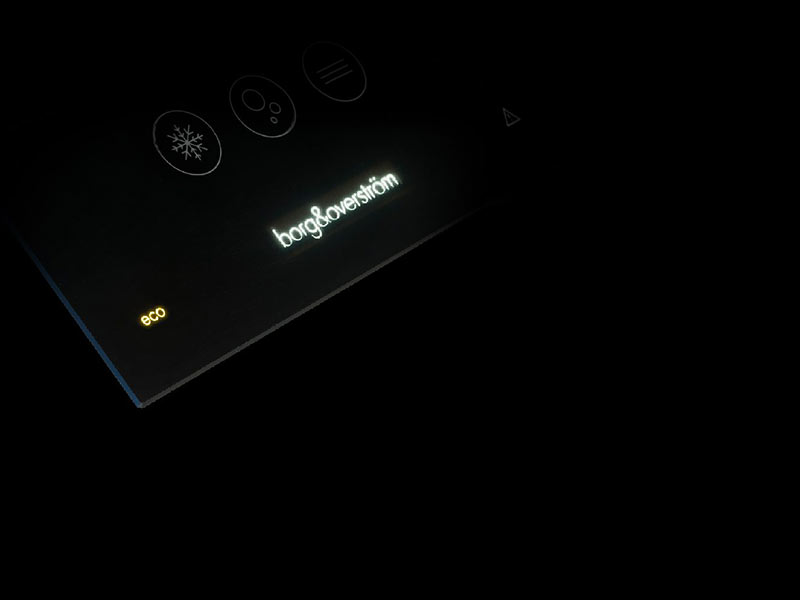 Efficiency A black and white image of a keypad in the dark.