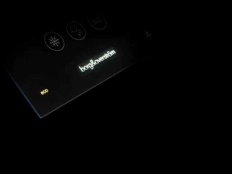 Efficiency A black and white image of a keypad in the dark.