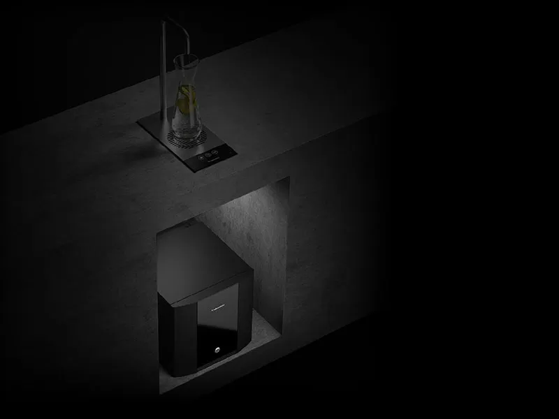 Pro-Core A black and white image of a bottle in a dark room.