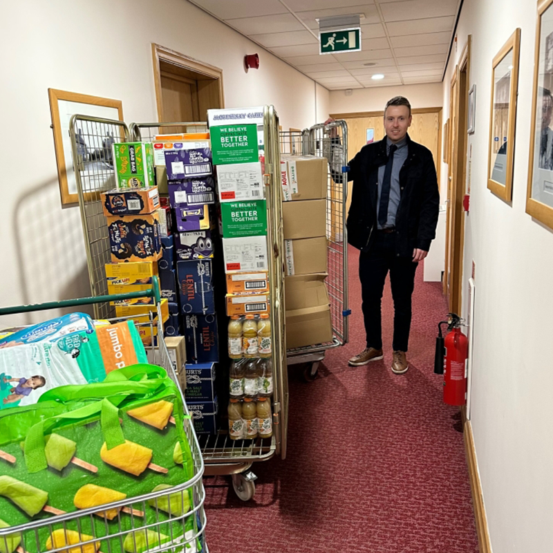Coinadrink-foodbanks Tom Williams, Managing Director of West Midlands vending operator Coinadrink Limited, with our donation to the Bloxwich Blakenall Food Bank.