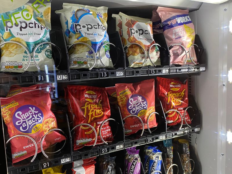 Snack Vending Machines A vending machine filled with chips and snacks.
