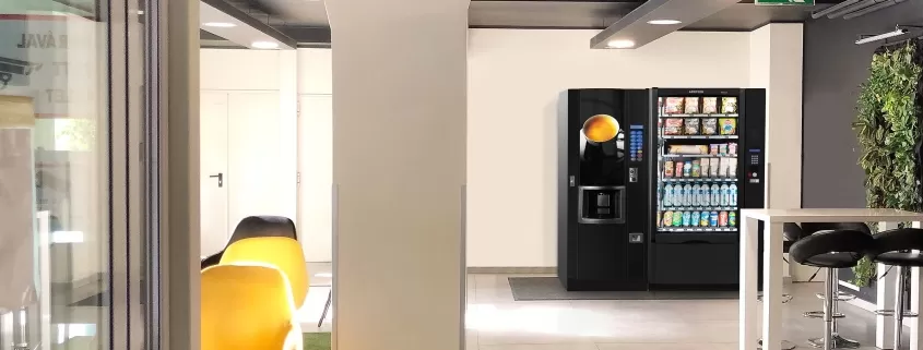 Snack and hot beverage vending machines in the workplace.