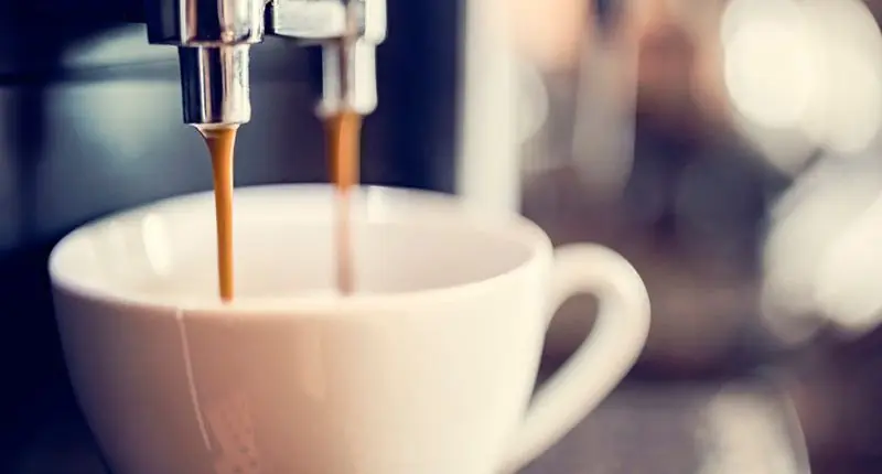 A commercial coffee machine fitted with a Brita water filter enhances the quality of your beverage.