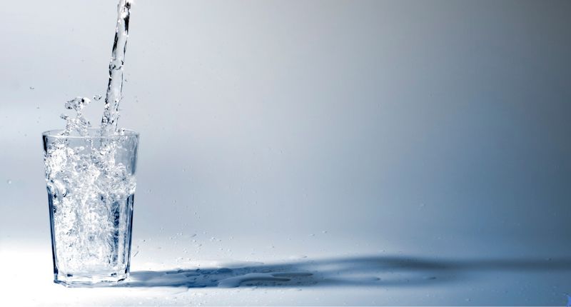 Symptoms of drinking too much water include headaches, but you need to remember to make sure you're still drinking enough water.