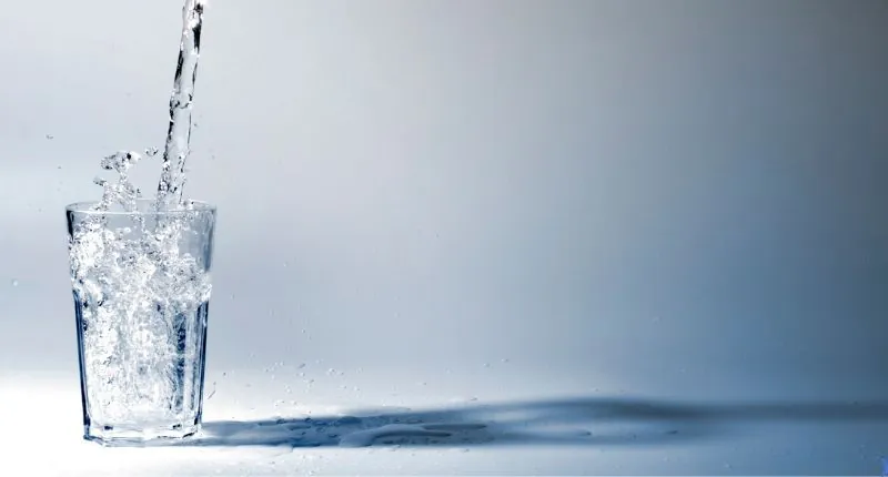 Symptoms of drinking too much water include headaches, but you need to remember to make sure you're still drinking enough water.
