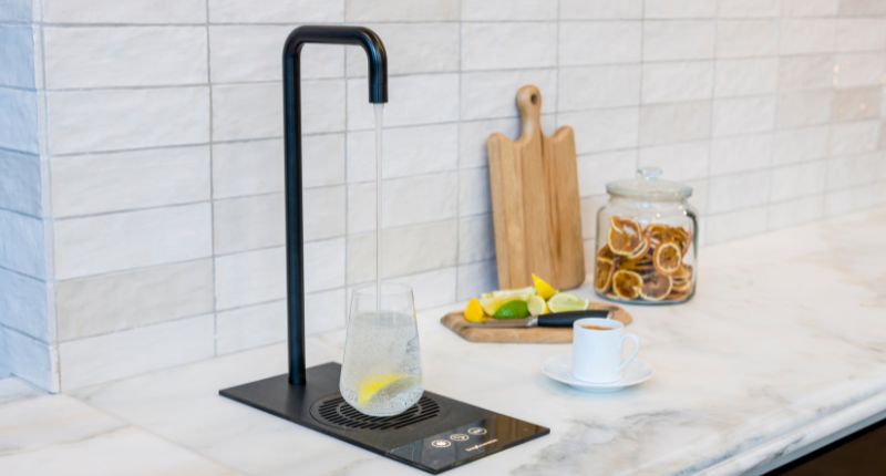 A hot water tap vs kettle shows the tap to be much more modern, stylish, efficient and quicker to dispense boiling water.