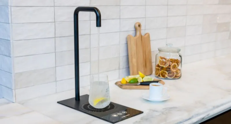 A hot water tap vs kettle shows the tap to be much more modern, stylish, efficient and quicker to dispense boiling water.