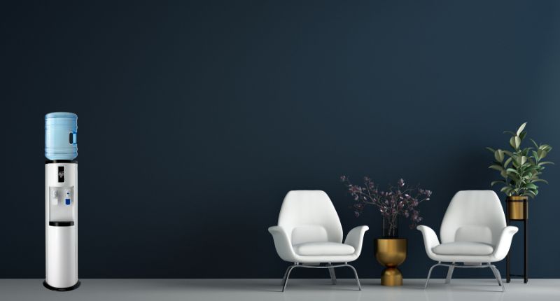 How do non-plumbed water dispensers work, such as the AA First 3300X?